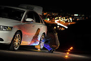 StonePoint LED Lighting emergency LED road flare kit with 3 roadside beacons, magnetic base, flashing or steady red lights, and storage bag.