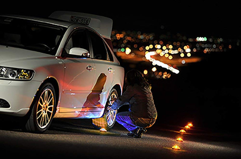 StonePoint LED Lighting emergency LED road flare kit with 3 roadside beacons, magnetic base, flashing or steady red lights, and storage bag.