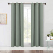 NICETOWN black blackout curtains in greyish green, thermal insulated room darkening drape panels for windows or doors.