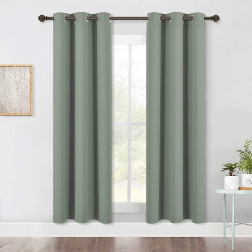 NICETOWN black blackout curtains in greyish green, thermal insulated room darkening drape panels for windows or doors.