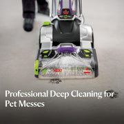 Bissell ProHeat 2X Revolution Pet Pro Plus upright deep cleaner with powerbrush, hose, and pet stain tool for carpets and upholstery.