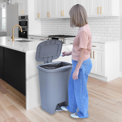 Glad large 20-gallon grey kitchen trash can with lid, foot pedal, odor protection, and garbage bag rings.