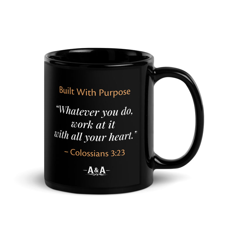 Black glossy Durrett Recovery "Work With All Your Heart" mug with a handle on the right, 11 oz capacity.